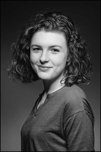 monochrome Portrait photograph of a girl with a pearl earring