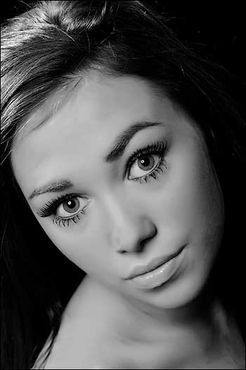 Big-eyed black and white portrait photograph of a Staffordshire woman